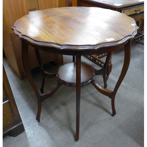 136 - An Edward VII walnut six legged occasional table