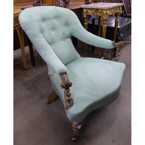 140 - An early Victorian giltwood and fabric upholstered lady's chair