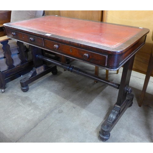 149 - A William IV mahogany and red leather topped two drawer writing table