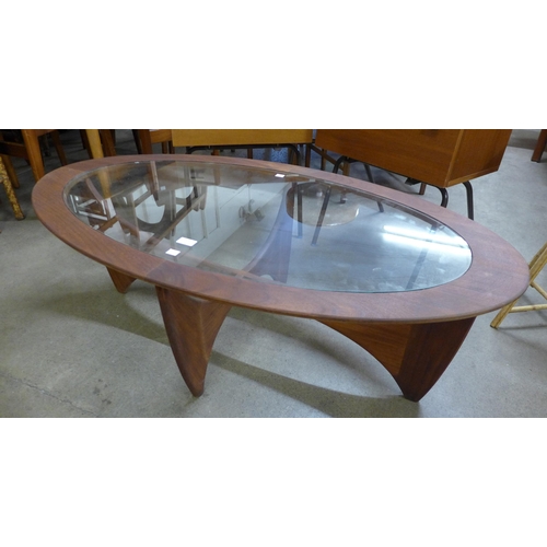 15 - A G-Plan Astro teak and glass topped oval coffee table