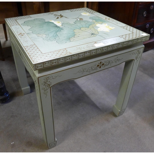 150 - An oriental chinoiserie painted hardwood occasional table