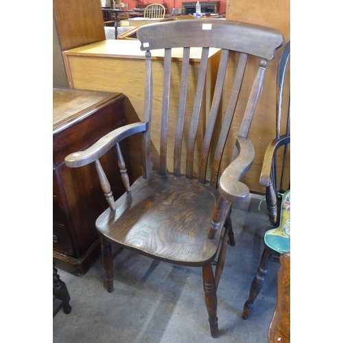 156 - A Victorian elm and beech farmhouse armchair