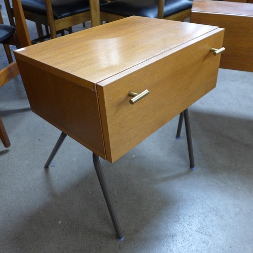 16 - A pair of teak and black metal metal single drawer bedside chests