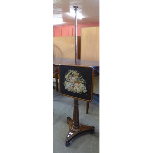 162 - A Victorian mahogany and embroidered pole screen