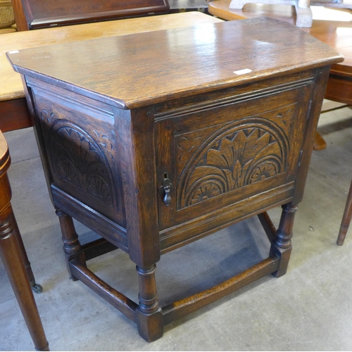 165 - A 17th Century style carved oak credence cupboard