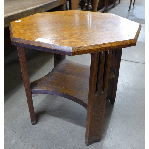 169 - An Arts and Crafts hexagonal oak occasional table