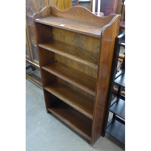 174 - An Arts and Crafts oak open bookcase