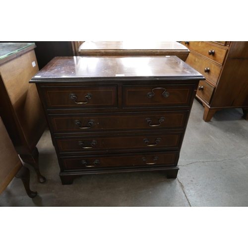 185 - A small inlaid mahogany chest of drawers