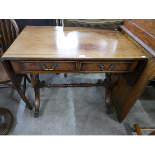 195 - A Regency style mahogany drop-leaf sofa table