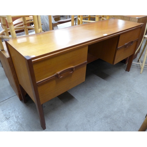 20 - A teak desk