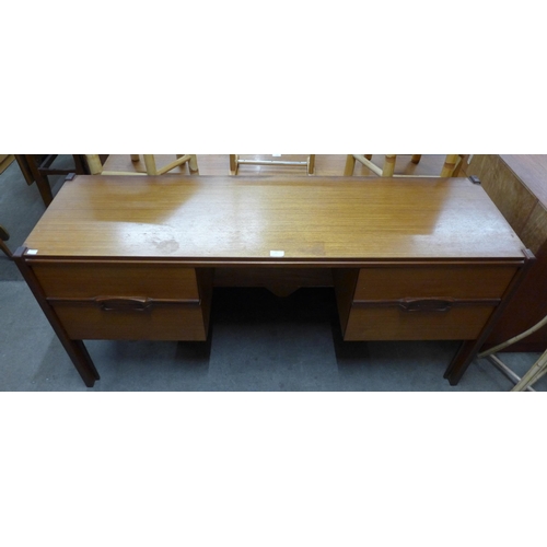 20 - A teak desk