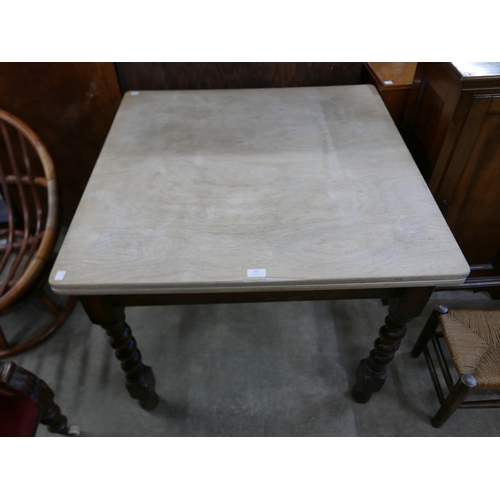 201 - An oak barleytwist draw-leaf table, painted towel rail and a pair of beech and bergere chairs