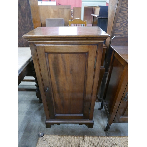 202 - An Edward VII walnut single door cupboard, mahogany single door cupboard and a beech and cord stool