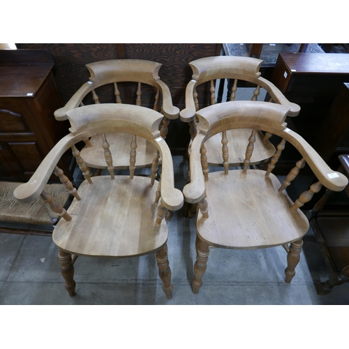 203 - A set of four Victorian style beech smokers bow chairs