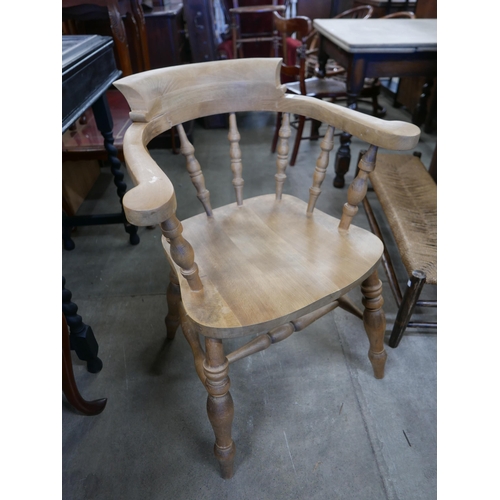 203 - A set of four Victorian style beech smokers bow chairs