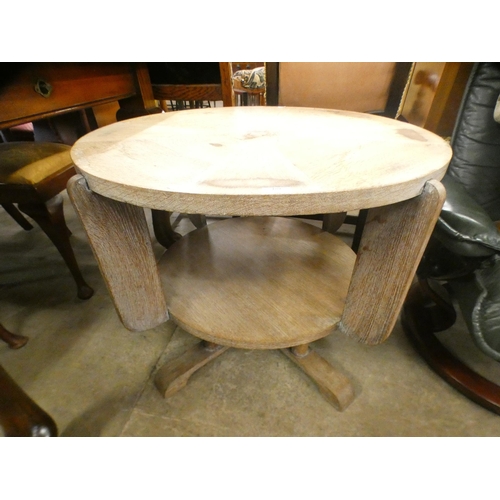 209 - An Art Deco Heals style oak circular two tier coffee table