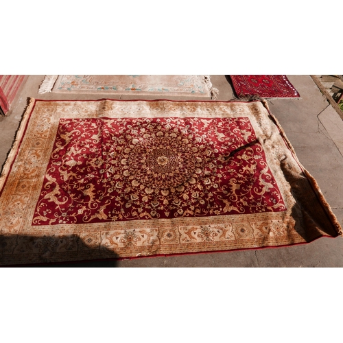 237 - Two double sided red ground prayer rugs, another red ground rug and two others