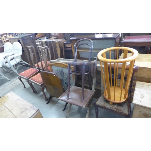 243 - A set of four oak chairs, bentwood chair, pine bookcase, oak bookcase, etc.