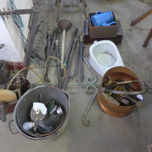 260 - A galvanised bucket, heater, assorted pumps, copper jug, ponch, etc.