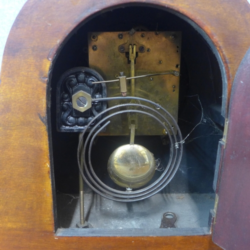 294 - An Art Deco inlaid mahogany mantel clock