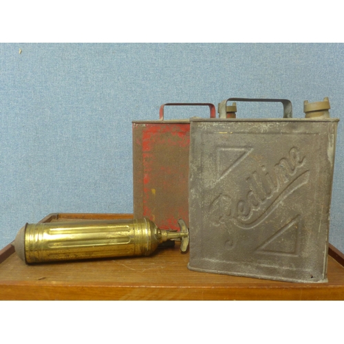 297 - Two fuel cans; Redline and IM and BP Limited, and a Pyrene fire extinguisher