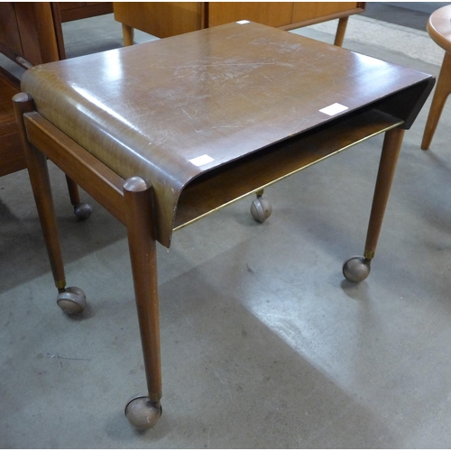 32 - A Danish teak and tola wood occasional table