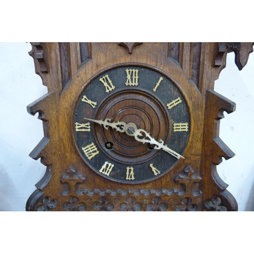 351 - A late 19th Century carved oak cuckoo clock, a/f