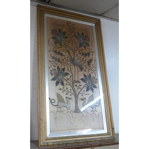 354 - A Chinese silk embroidery with silver thread, framed