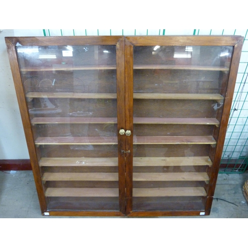 358 - A glazed mahogany display case