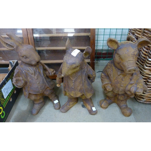 360 - A set of three cast iron Beatrix Potter garden figures