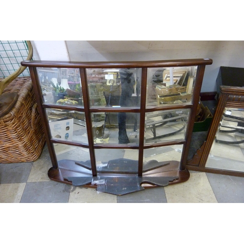 368 - An Edward VII walnut overmantel mirror and a bow front mirror