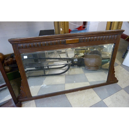 368 - An Edward VII walnut overmantel mirror and a bow front mirror