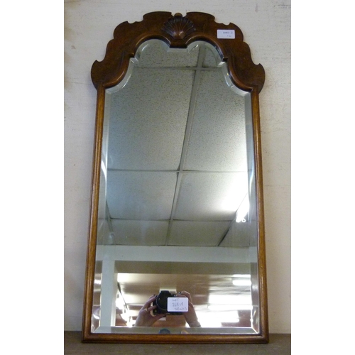 368A - A walnut framed salon mirror