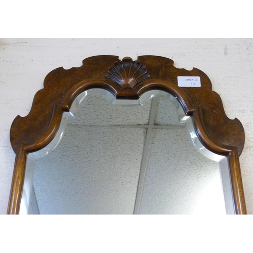 368A - A walnut framed salon mirror