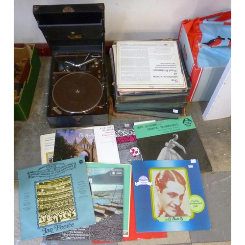 370 - A vintage H.M.V. portable gramophone and assorted records