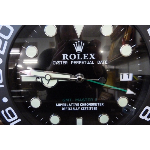 373 - A Rolex style dealer's display wall clock