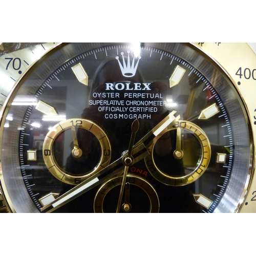 374 - A Rolex style dealer's display wall clock