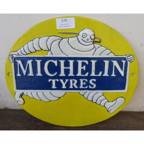 379 - A painted cast iron Michelin Tyres advertising sign