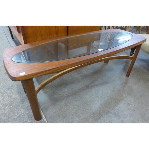 38 - A Nathan teak and glass topped rectangular coffee table