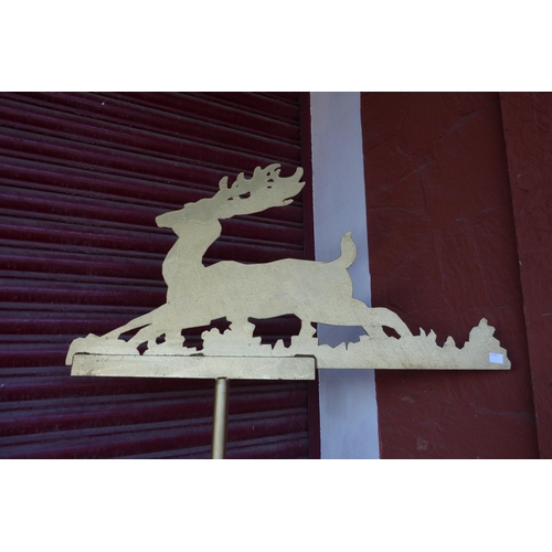 382 - A cast iron painted deer topped weather vane