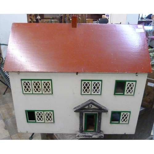 383 - A painted wooden doll's house