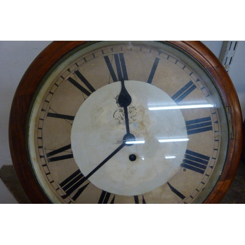 384 - A Victorian circular mahogany Postman's fusee wall clock