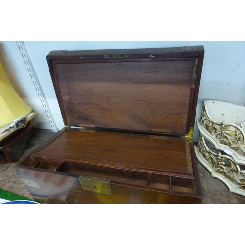 388 - A Victorian mahogany and brass mounted campaign writing slope