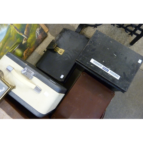 395 - An early 20th Century plywood box, a briefcase, handbag, typewriter, etc.