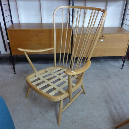 4 - An Ercol Evergreen Blonde beech armchair