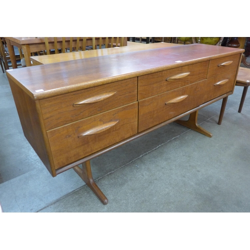 41 - An Austin Suite teak six drawer sideboard