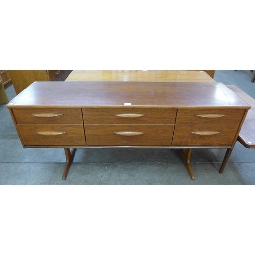 41 - An Austin Suite teak six drawer sideboard