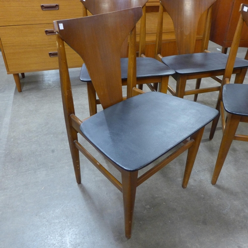 51 - A set of four teak dining chairs