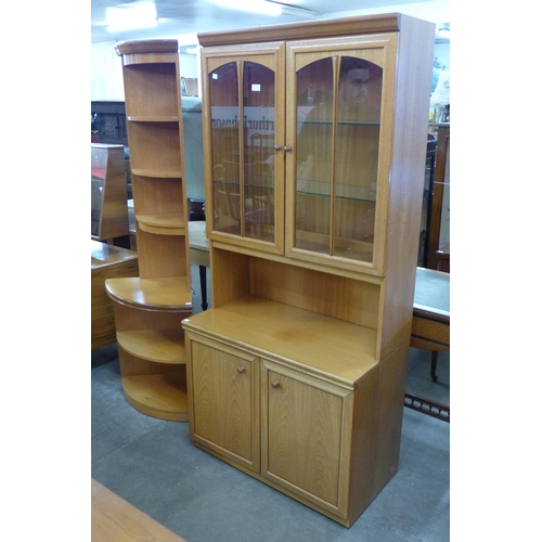 56 - A teak display cabinet and a corner cupboard