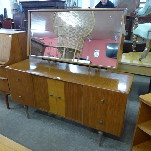 57 - A teak dressing table